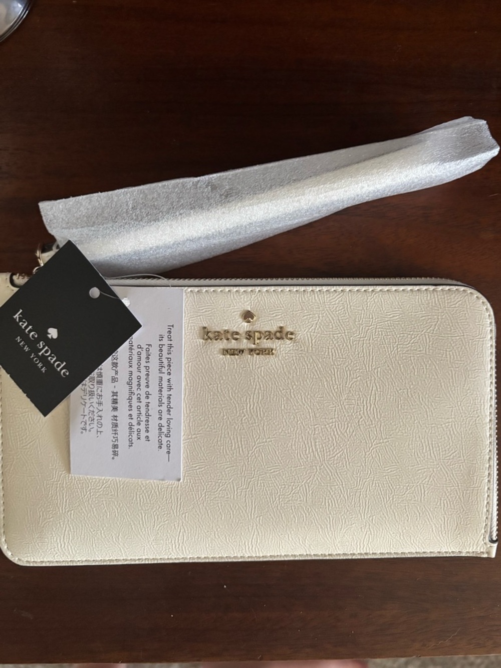 kate spade Cream Lucy L-Zip Wristlet with Gold Hardware
